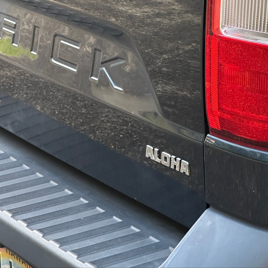 Cherreh Chromes ALOHA Chrome Car Decal on a truck